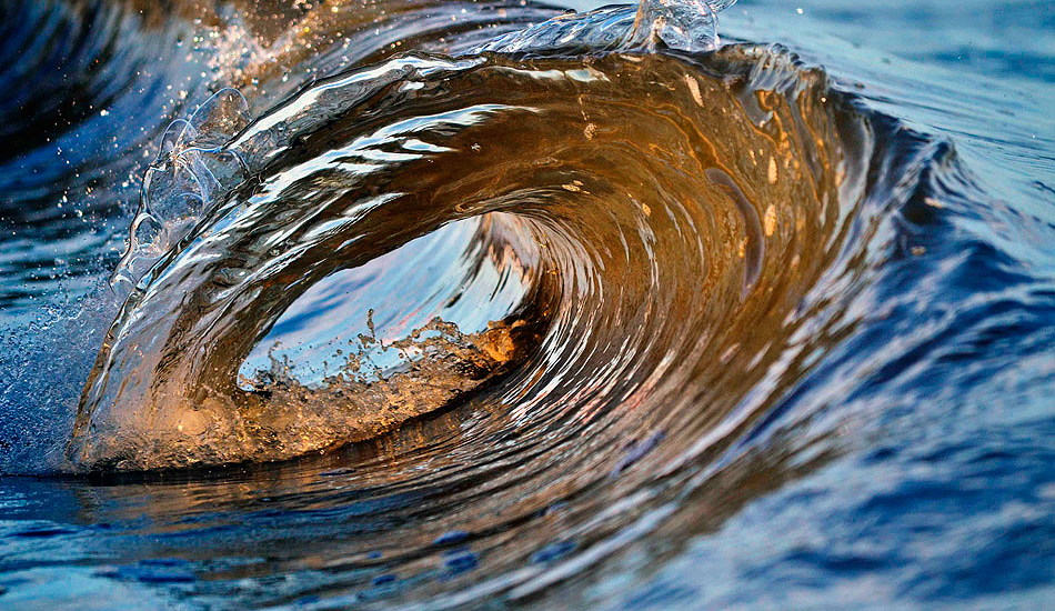 Swell was almost non-existent on this day. After searching the beaches, I found a small peak forming just feet from the shore which is when this little gem rolled through. Photo: <a href=\"https://www.debmwaveart.webs.com/\" target=_blank>Deb Morris</a>.