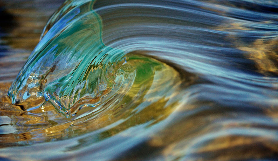 With a major lack of swell, I had to hunt to find even a ripple but this glassy little gem rolled through. It almost looks bashful! Photo: <a href=\"https://www.debmwaveart.webs.com/\" target=_blank>Deb Morris</a>.