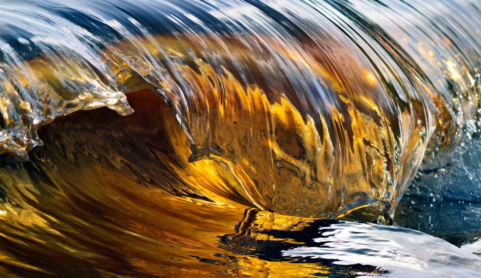 A combination of flood waters and the glow of the sunrise. Photo: <a href=\"https://www.debmwaveart.webs.com/\" target=_blank>Deb Morris</a>.