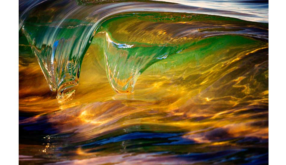 Just like a snake\'s tongue, this wave split into two forks before being reclaimed by the ocean. Photo: <a href=\"https://www.debmwaveart.webs.com/\" target=_blank>Deb Morris</a>.