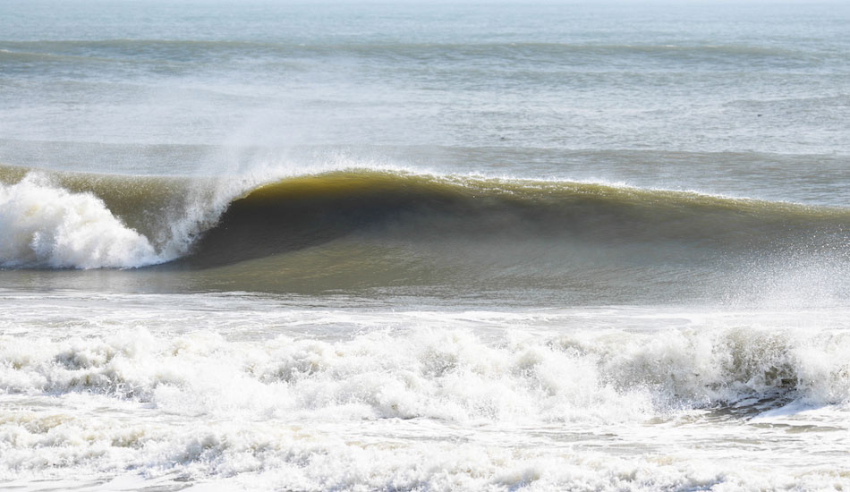I saw a hundred identical lefts peel across this piece of sand. It was a machine! Photo: <a href=\"https://domdentephoto.bigcartel.com/\">Dom Dente</a>