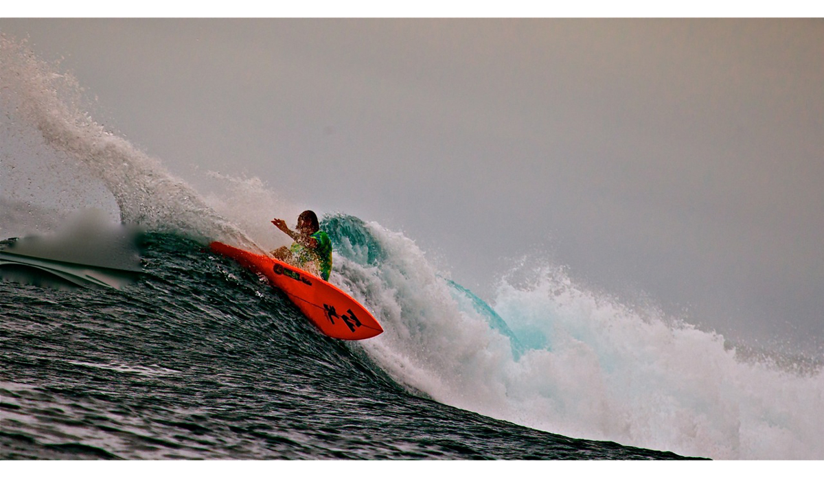 This photo was on our first day arriving to the island. It\'s at a spot called Bank Vaults, a very fun right hander that gets really good on the right swell
and has an amazing tube. At the right size, it was a fun warm up session. Photo: <a href=\"https://www.mentawaiislands.com/\">Kandui Resort</a>