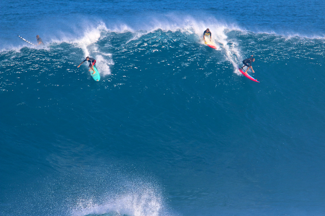 Ian Walsh and unknown splitting the peak.