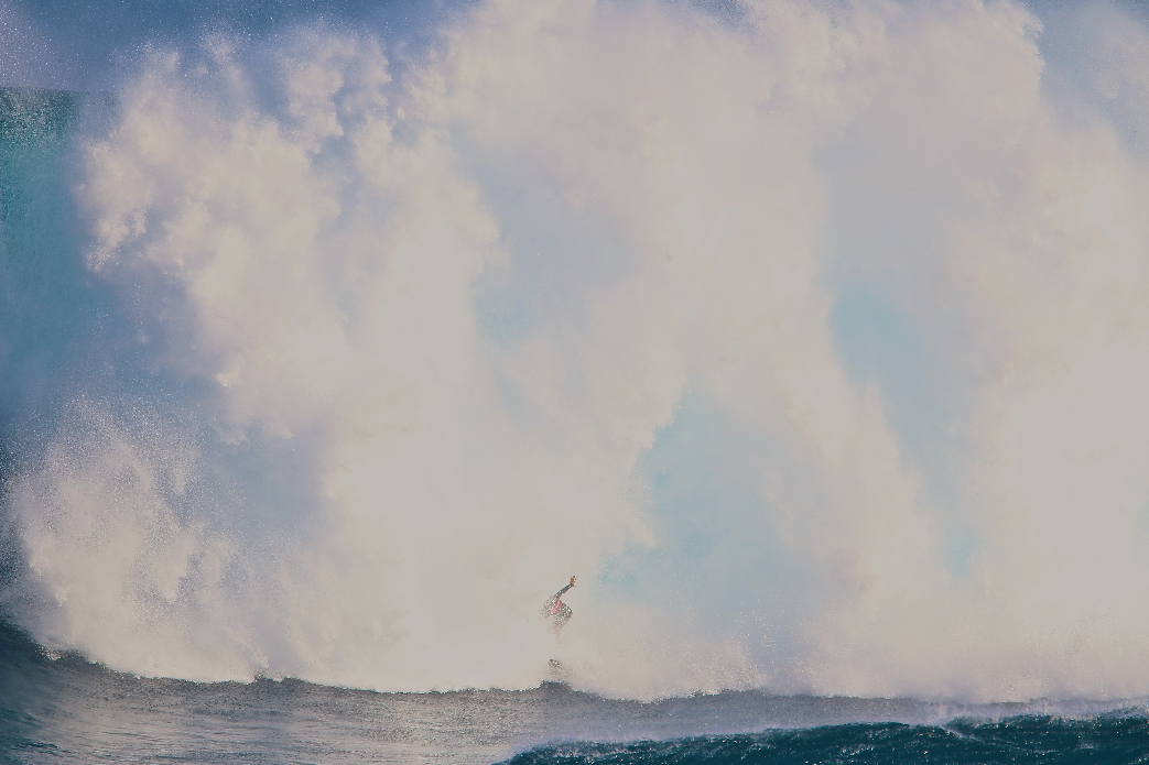 Shane Dorian about to get a Peahi beatdown. It\'s all part of the game.