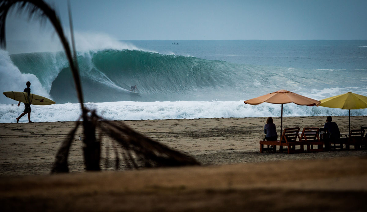 This image was captured on May 13th, 2014, during my first surf photo session in Puerto Escondido. It was my first trip to Mexico and my first trip with Trevor Carlson, our buddy Finn Armstrong, and Chris Mumford. They had all already paddled out and I was walking down the road fumbling with my camera gear while trying to carry a lidless hot cup of coffee. I remember putting my bag down while assessing the locals because I was in a new place. Immediately after I put my lens on and turned my camera on, I was watching this wave happen. I didn\'t even have my settings adjusted or anything, so I just pointed my camera and shot. To my surprise, the images were good enough to use. I was instantly pumped up for this session. I\'m not exactly sure who the surfer is on the wave. But I do know that this photo is one of my favorite photos I have ever taken. Photo: <a href=\"https://instagram.com/dougfalterphotography/\"> Doug Falter</a>
