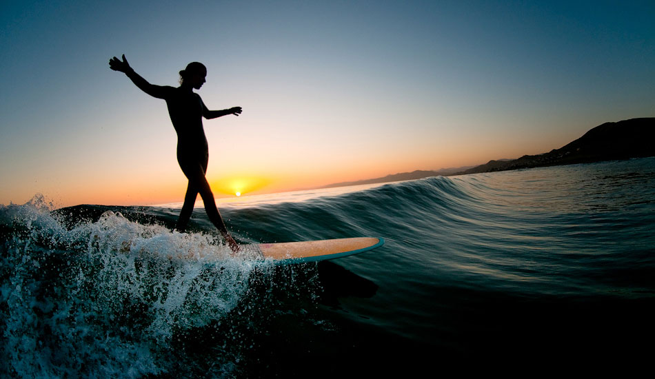 Big Sur is a place where people journey to find peace. As the sun disappears behind the horizon, peace is the only word to describe this dance down the line. Photo: <a href=\"https://burkardphoto.com/\" target=_blank>BurkardPhoto.com</a>
