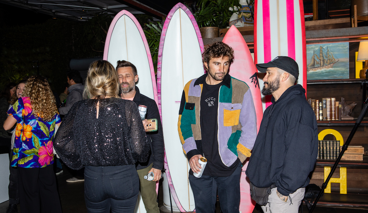 Talkin\' shop next to boards from the Pink Board Project. Photo: Megan Youngblood