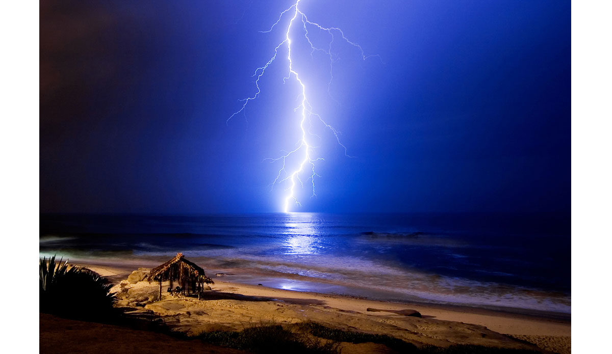 A couple years after moving to La Jolla I shot this image of the Windansea shack during a rare lightning storm.  I shot photos in this location for about 4 hours until I finally got the shot I was waiting for.  When I got home I did a quick process on this image and emailed it to about a dozen friends.  The next day when I woke up I had over 400 new emails from people all over the world inquiring about this photo.  I was really blown away.  It gave me a glimpse of the impact that digital photography would have on my ability to share moments and experiences instantly.  Coincidentally, this image was shot the same month that Facebook was launched. Photo: <a href=\"http://anthonyghigliaprints.com/\">Anthony Ghiglia</a>