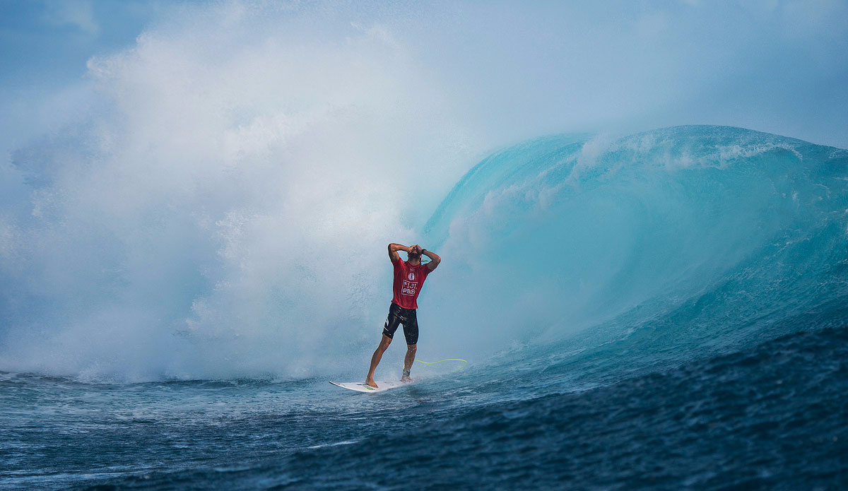 Owen Wright of South Coast, NSW, Australia (pictured) holds his head in disbelief after emerging from his second Perfect 10 point ride at the Fiji Pro at Cloudbreak on Monday June 15, 2015. Owen produced a flawless performance during Round 5, riding a pair of Perfect rides for a heat total of 20.00 (out of a possible 20.00). Photo: <a href=\"https://www.worldsurfleague.com/\">WSL/<a href=\"https://instagram.com/kirstinscholtz/\">Kirstin Scholtz</a>