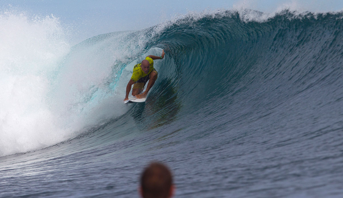 Kelly Slater tucks in, but to no avail. He was eliminated by the in-form Michel Bourez in the Quarterfinals, Fiji Pro 2014. Photo: <a href=\"https://www.aspworldtour.com\">ASP | Kirstin</a>