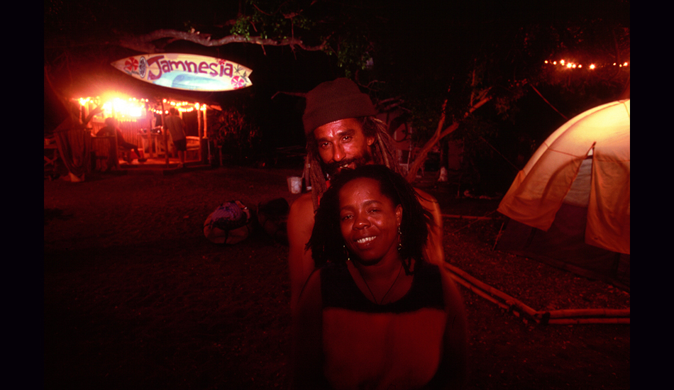 December 2000 - Billy and Maggie Wilmot are the husband and wife owners and operators of the Jamnesia Surf Camp in the Bull Bay section of Kingston, Jamaica. This was for SURFER and became the first editorial photo article run in any mainstream surf magazine on Jamaica. The camp has grown exponentially since then and many a magazine and video crew have visited a enjoyed great waves there. It has been primarily through the diligence of Billy and Maggie that Jamaica is now recognized as a legitimate surf travel destination and that some of the island\'s young surf talent has made a mark on the international stage. Image: <a href=\"https://stevefitzpatrick.com/\" target=\"_blank\">Fitzpatrick</a>  