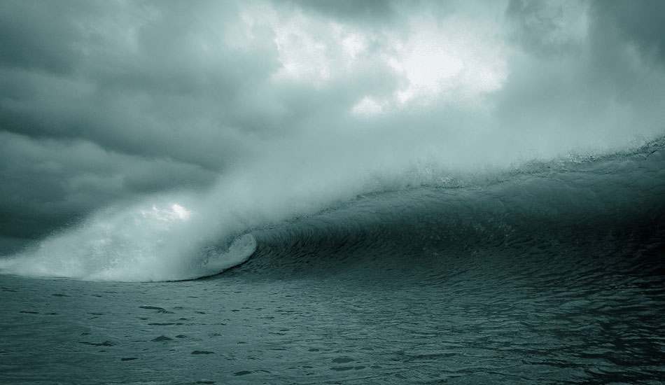 I shot this at a lone stretch of beach in central Florida during Hurricane Leslie. For 2 days this place was on fire with mostly right tubes really opening up. There was a lot of water moving that day, and as I was being ripped north down the beach. I came up and this left was holding up and draining right at me just as a ray of light came out of the clouds to touch the top of the wave. Photo: <a href=\"https://www.marksainwilson.com/?splash=1\" target=_blank>Mark Wilson</a>