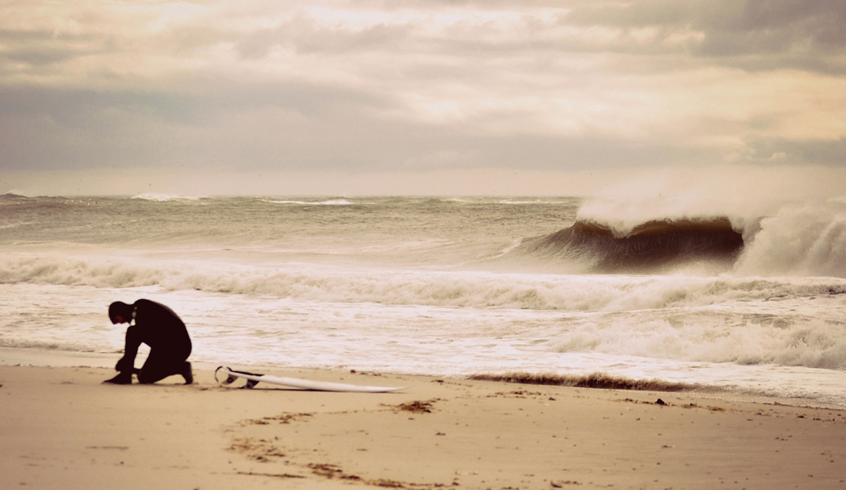 Ready for battle. 5 mm wetsuits, boots, and gloves with a deafening hood is often a struggle. But to most NJ surfers, especially the ones I know, they wouldn’t have it any other way. The struggle is real, but often worth every second. Here\'s Conor Willem preparing for battle.  Thomas Larney