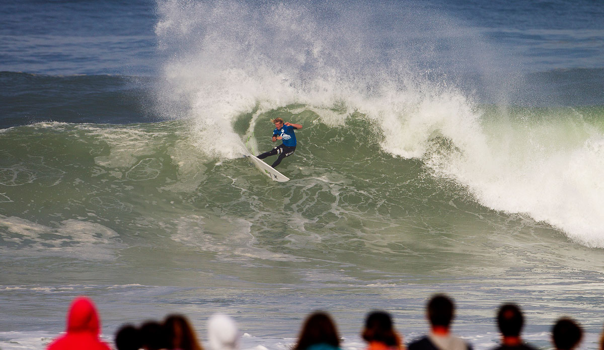 John John Florence of Oahu, Hawaii (pictured) advanced into the Semifinals of the Quiksilver Pro France, defeating Kolohe Andino (USA) in the Quarterfinals on Saturday October 4, 2014. Florence was the morning\'s standout performer, posting the event\'s first Perfect-10 during his Round 5 clash, flowed by a near perfect 9.00 (out of a possible ten points) in the Quarterfinals. Photo: <a href=\"https://www.aspworldtour.com/\">ASP</a>/<a href=\"https://www.kirstinscholtz.com/\">Kirstin Scholtz</a>