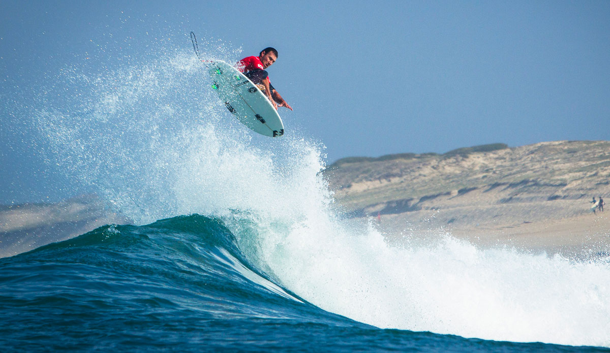 Joel Parkinson of Coolangatta, Gold Coast, Australia (pictured) takes to the air to win his Round 1 heat at the Quiksilver Pro France on Friday September 26, 2014. Parkinson scored a 6.67 and 8.83 rides (out of ten) to advance into Round 3. Photo: <a href=\"https://www.aspworldtour.com/\">ASP</a>/ Poullenot