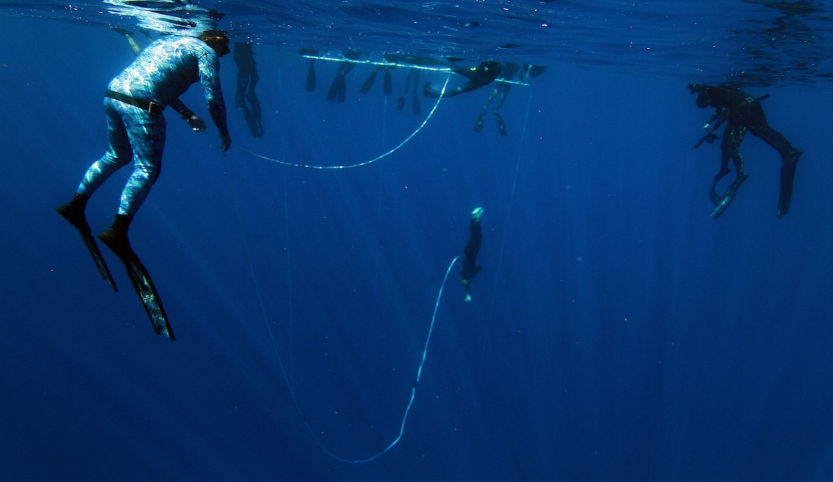 This exercise recreates the feeling of a hold down and the disorientation that accompanies it. While blindfolded and holding a free weight, you are dropped from the surface. You hit a depth of 66 feet. Then you find your way back up. Photo: <a href=\"https://instagram.com/el_squid\">Anthony Dooley</a>