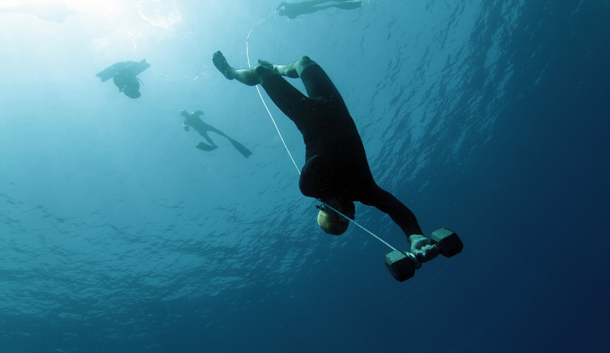 The 25lbs of weight carries you down to 66 feet while a swim cap covers your eyes. Hold on. Photo: <a href=\"https://instagram.com/el_squid\">Anthony Dooley</a>