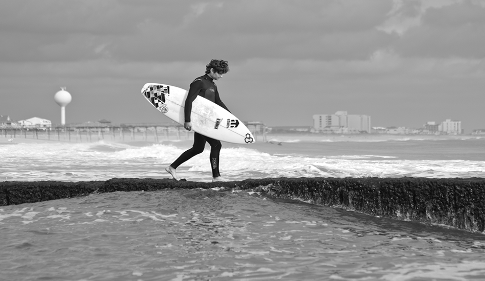 Joe Cheshire, jay-walking. Wrightsville Beach, NC. <b>Photo:</b> <a href=\"https://www.chrisfrickphotography.com/\" target=_blank>Chris Frick</a>