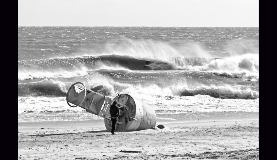 S Turns. OBX, NC 2011. Charlie Weatherby tucked into a drainer. Since Hurricane Sandy, this spot no longer exists. Photo: <a href=\"https://www.chrisfrickphotography.com/\" target=_blank>Chris Frick</a>
