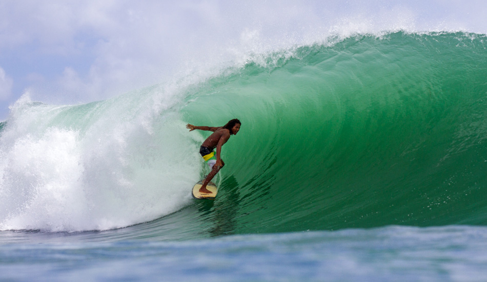 We spent a good couple of months waiting for this wave to fire up. Local Rasta having the time of his life. Photo: <a href=\"https://www.gaz-art.com/\">Gary Parker</a>