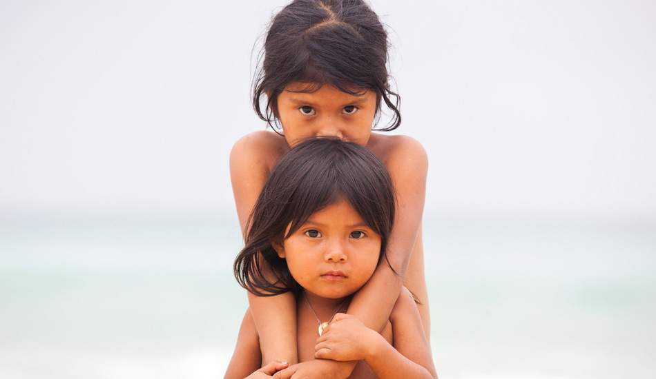 We stopped to visit an indigenous village in Panama on a sailing trip down the Caribbean and were greeted by the most beautiful people.  The kids loved their picture taken and followed us around for hours. Photo: <a href=\"https://www.gaz-art.com/\">Gary Parker</a>