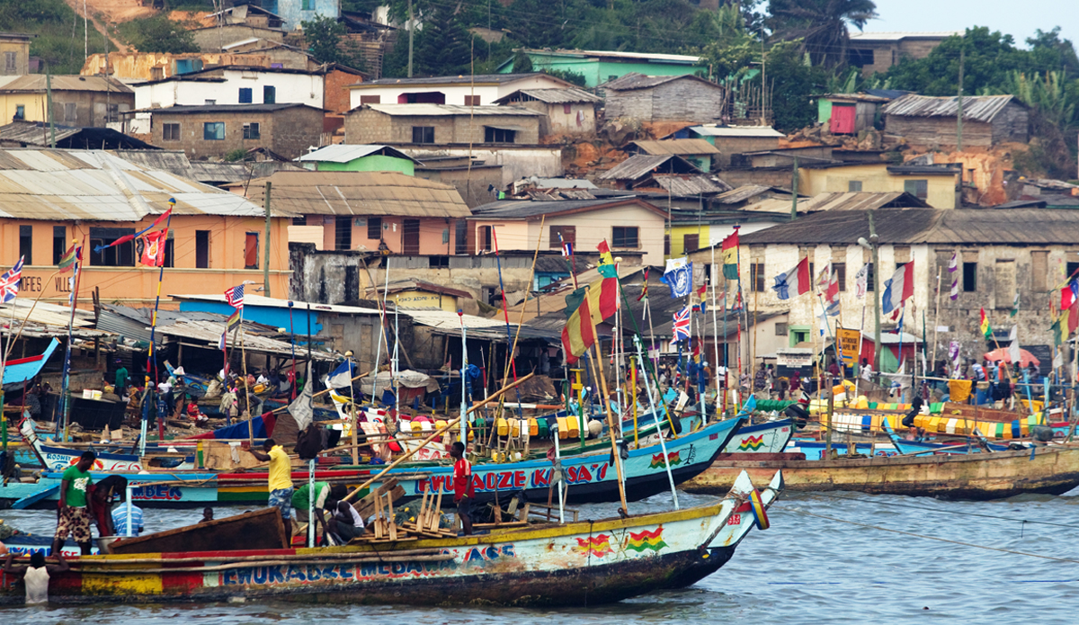 Ghanaians, like most Africans, are football crazy and if you look closely, along with the odd Ghanaian flag, every local fishing boat either supports a different national or European football team. Photo: <a href=\"https://www.gregewingphoto.com/\"> Greg Ewing</a>