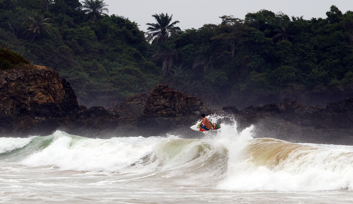 John boosting at an unnamed spot near Cape Three Points. Photo: <a href=\"https://www.gregewingphoto.com/\"> Greg Ewing</a>