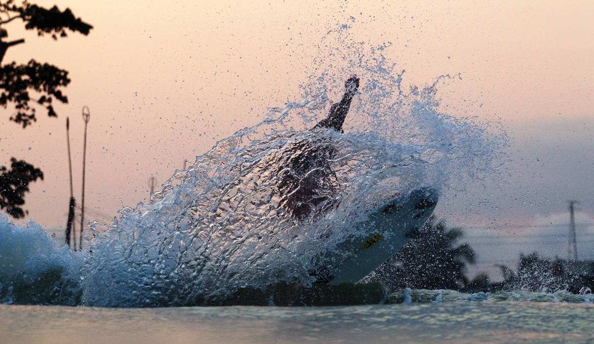 Ricky on his last wave before heading to the local beach bar. Photo: <a href=\"https://www.gregewingphoto.com/\"> Greg Ewing</a>