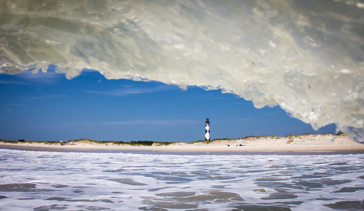 Perfect Day at Cape Lookout, babes on the beach and my crew in the water. Snagged this little window of the lighthouse as a keepsake. Photo: <a href=\"https://www.surferphotos.com/\">Graham Hunt</a>