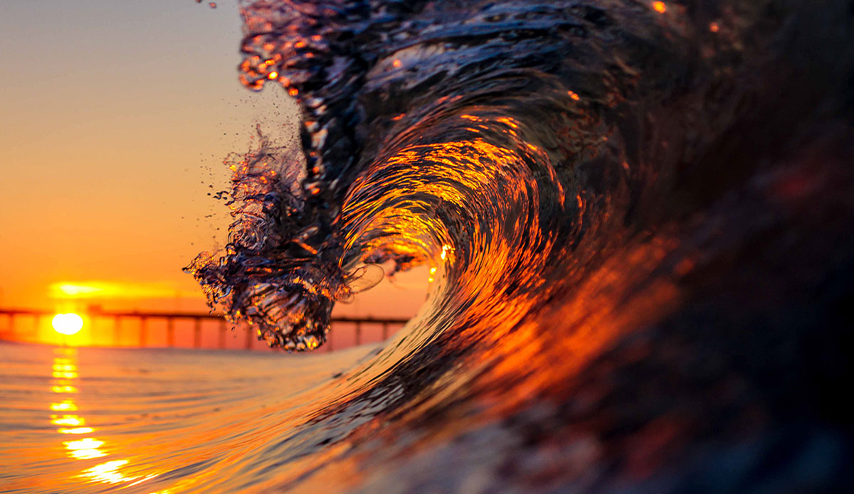 Mornings like these are why I live where I live.  Emerald Isle is a south-facing beach so we get to catch the sunrise and sunsets. Photo: <a href=\"https://www.surferphotos.com/\">Graham Hunt</a>