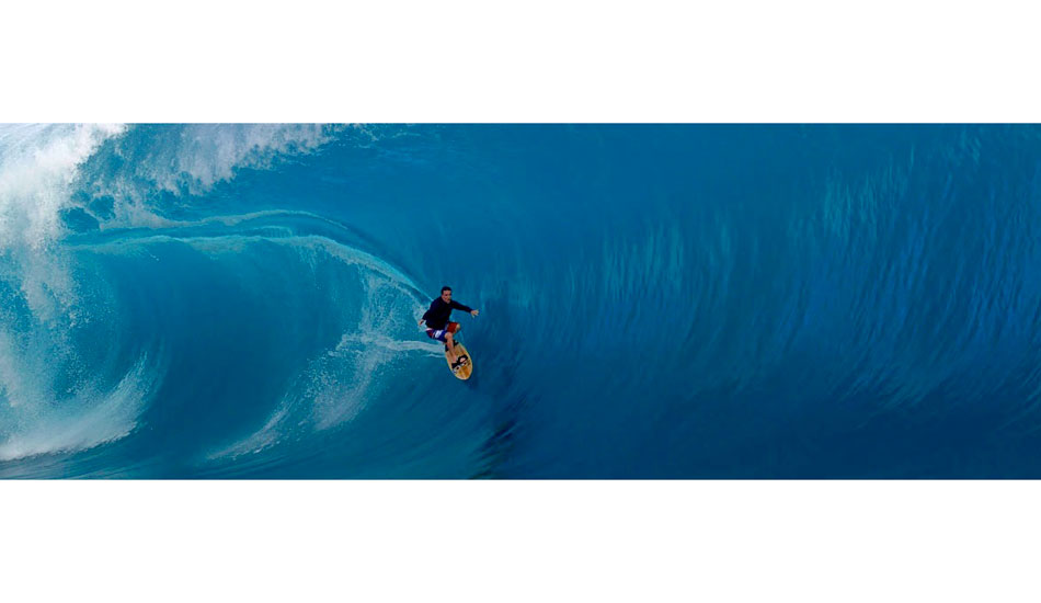 Kalani Chapman, Teahupoo 2013. An  instant later he fell and got badly tweaked. Screen capture from RED Epic camera.  ISO800, 200mm lens at f11, 100fps. at 5k. Photo: <a href=\"https://www.greghuglin.com\">Greg Huglin.</a>