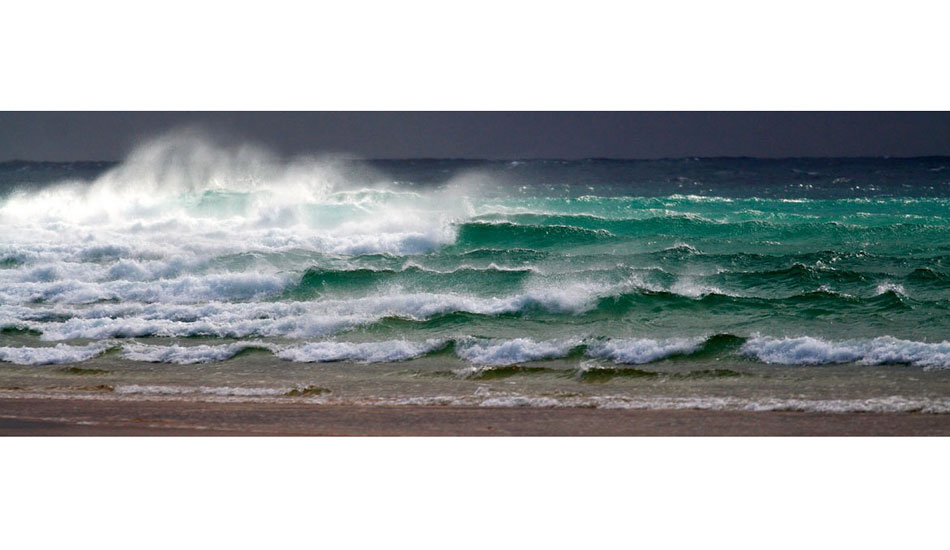 Queensland 2013. Nonstop 6\'  empties. When the wind died there was no one around except us. Photo: <a href=\"https://www.greghuglin.com\">Greg Huglin.</a>