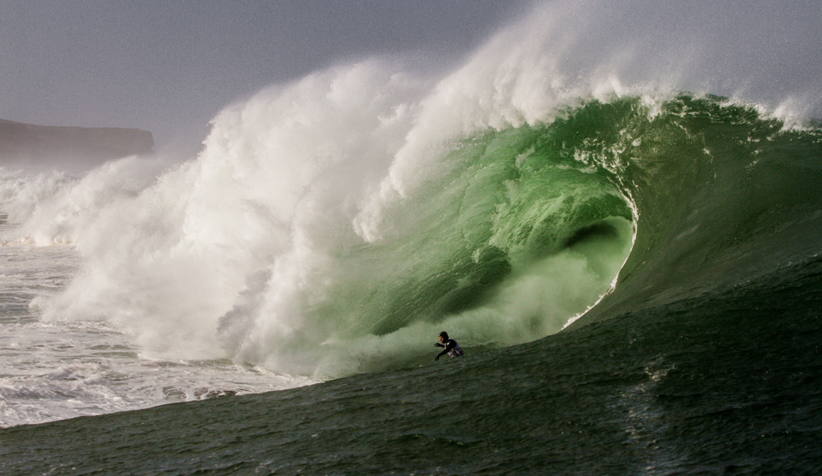 Mullaghmore is evil. Evil is Mullaghmore. When it pays off and you have defeated evil, nothing seems to matter anymore. The Earth stands still in your little mind. Man vs. beast is what it comes down to. David vs. Goliatch, if you will. With its random steps, its freezing waters, gale-force winds, gurgling boils, its capability to handle any storm sent in its direction, Mullaghmore is totally insane. When this wave hit me, I took flight. It launched me in the air so high that I was weightless for at least 5 seconds. And then, like a ton of bricks hitting me at high speed, my limbs flung around like a rag doll. I was still attached to half of my board when I felt a strong wrenching on my left leg. It stretched and pulled my ligaments in my knee so hard that it felt like my entire leg had been ripped right off my body. After it forced me to the bottom, I got torpedoed back up thanks to my life vest. What a sigh of relief to see my buddy Lyndon there to pick me up. Back to the harbor we went to assess the damage.  Photo: Christian McLeod