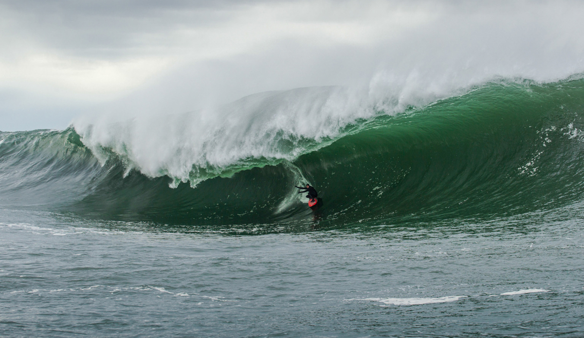 Oregon. January 2016. This was my favorite El Niño trip of the winter. It\'s rugged and uncrowded, just how I like it. Local boy Jeremy Rasmussen gave Will Skudin and I the invite to the slab. We showed up by ski and just started watching from the channel. This was easily one of the heaviest slabs I have ever been to. I decided not to watch for too long; sometimes I psych myself out that way. I grabbed the rope. Will was driving, and our approach was to backdoor the slab. This bomb came in, and Will whipped me in perfect, nice and deep. My instincts were to just keep a little weight on my back foot, hold my line, and not to do anything silly. The wave clamped at the end. It was probably the best wipeout scenario because I didn\'t hit bottom. Big thanks to the whole crew that day; I will never forget that vision! Photo: Scotty Hammonds       