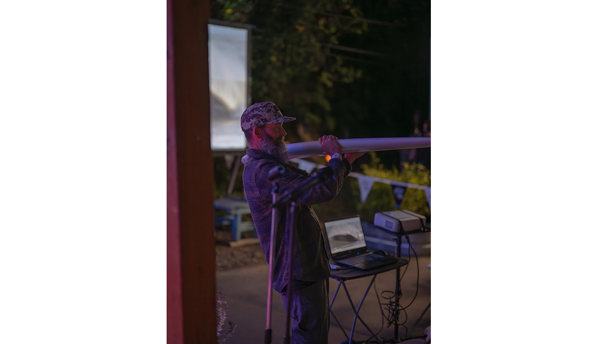 Newport icon Kirk Tice examines the Surfrider raffle board from Leboss Surfboards. 