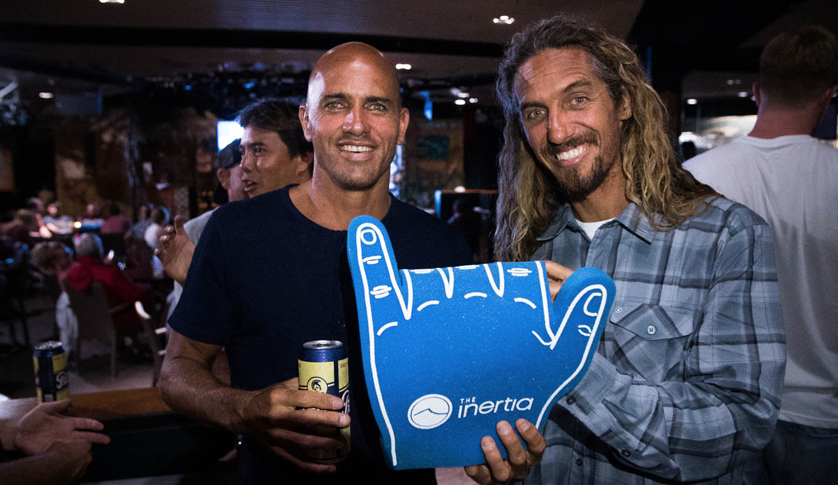 20 years later, two of surfing\'s most respected figures come together to celebrate the most iconic high five in surf history. Photo: Juicewhale