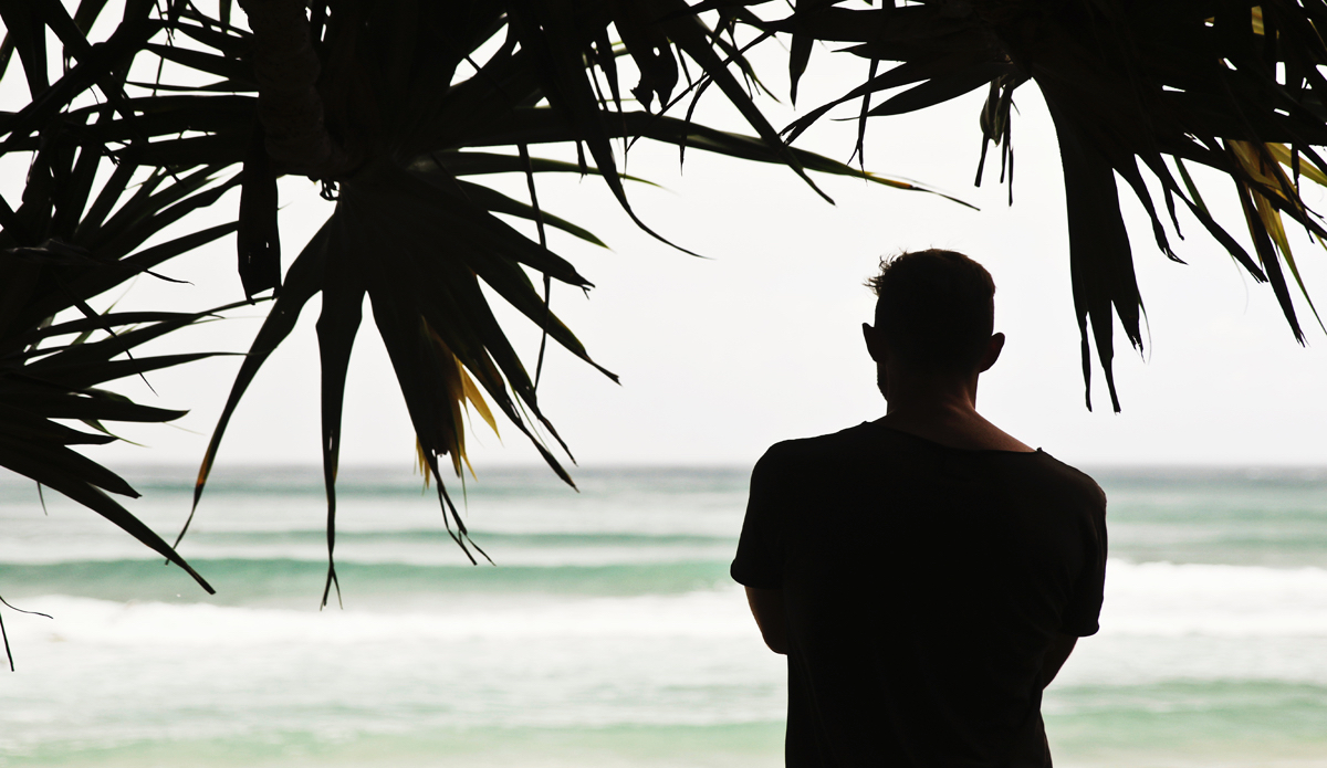 Cyclone swells and surf checks beneath the pandanus. Photo: <a href=\"https://www.instagram.com/hollytreephoto\">@HollyTreePhoto</a>