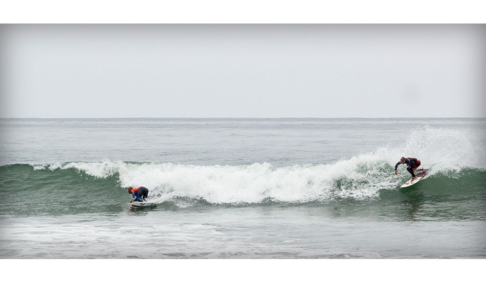 Kelly and Pat Gudauskas split a peak during their Round 3 heat. Photo: <a href=\"https://thesurfchannel.com/\">Shannon Quirk</a>