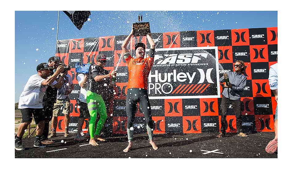 Taj enjoying his victory champagne shower. Soak it all in, champ. Photo: <a href=\"https://thehurleypro.com/\">Hurley</a>