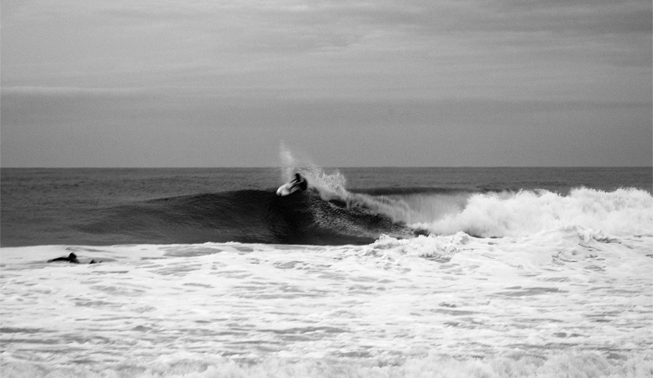 This is a shot of Tom Petriken with Luke Ditella paddling. These two surf a lot together and like to find big jetties to themselves. Image: <a href=\"https://mikeincitti.com/\" target=\"_blank\">Incitti</a>