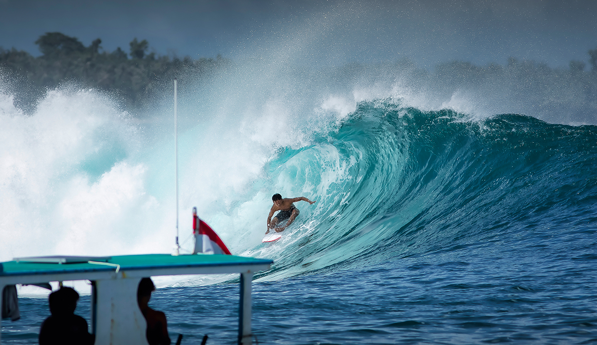 “The thing about the Mentawai is the barrier reefs. That means you rarely shoot from shore. The waves are so far away. Plus you never get tired of the boat angle. It’s so magical to watch surfing while you’re floating too, but still high and dry. When shooting from a boat, I always try to keep it interesting by putting something in the foreground. It gives the shot that maritime vibe. This is Ryuki Waida, Rio’s little brother, who’s really coming on.”

