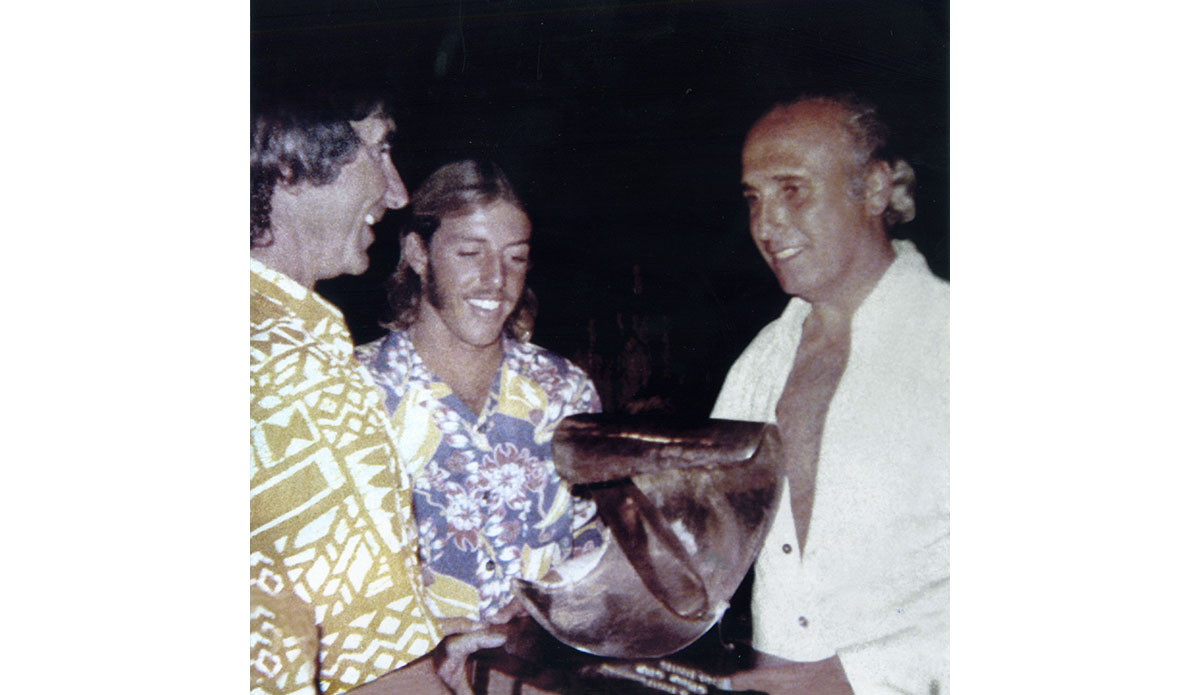 By the time California’s Rolf Arness won the World Surfing Championship at Johanna, Australia, in ‘70 and Hawaii’s Jimmy Blears (pictured with George Downing and ISA founder Eduardo Arena) won in ’72, competitive surfing was on the decline. For numerous reasons, the World Surfing Championship wouldn’t be held again until ‘78. Photo: <a href=\"https://www.isasurf.org/\">ISA Archive</a>