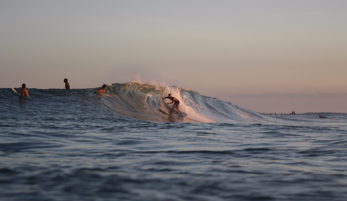 Cobi Christiansen sliding into a perfect Masonboro bowl. It gets dangerously crowded over there in the summer. Photo: <a href=\"https://instagram.com/zlottyphoto/\">Jake Zlotnick</a>