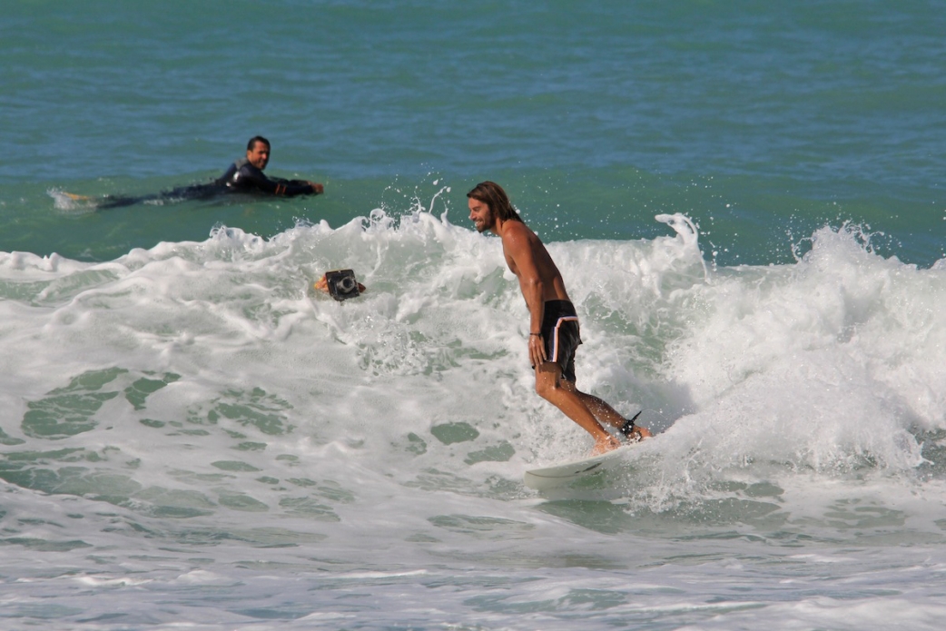 The Australian surfer Dave Rastovich riding small fun waves on the Tuscany coast. Photo: Bella Vita