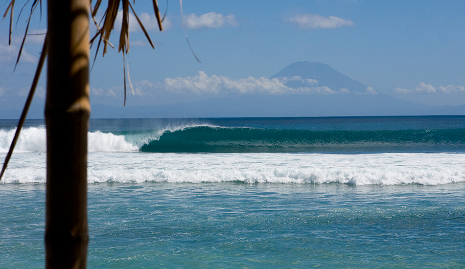 High tide at Desert Point. When it\'s this big, low tide is going to be deadly. Photo: <a href=\"https://www.reposarphoto.com\">Jason Reposar</a>