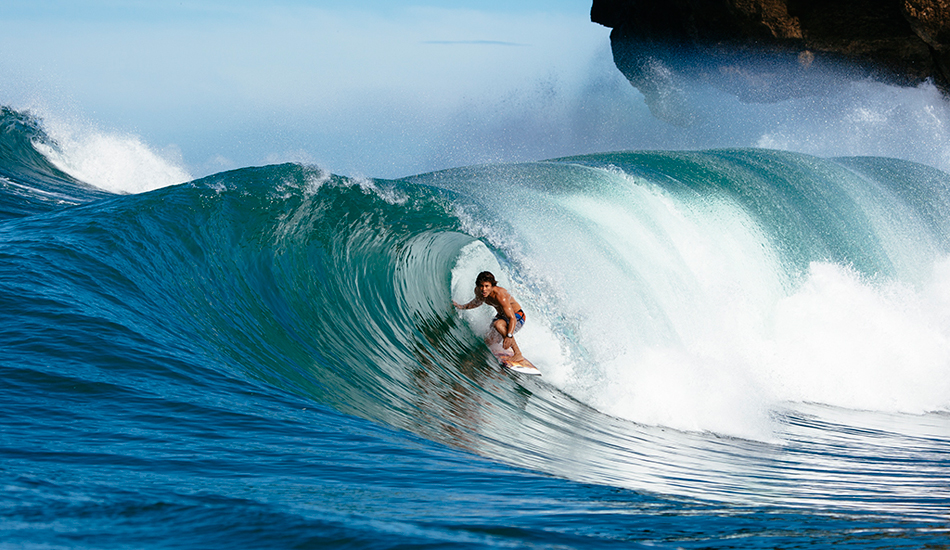 Lee Wilson nicely slotted in a Pacitan barrel. Photo: <a href=\"https://www.reposarphoto.com\">Jason Reposar</a>