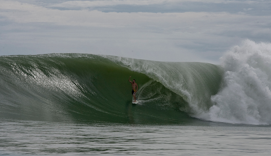 Not sure who this is, but he just got the craziest barrel at Nias. He deserves to claim it! Photo: <a href=\"https://www.reposarphoto.com\">Jason Reposar</a>