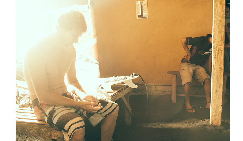 Taj Burrow preparing for a surf. Photo: <a href=\"https://www.reposarphoto.com\">Jason Reposar</a>