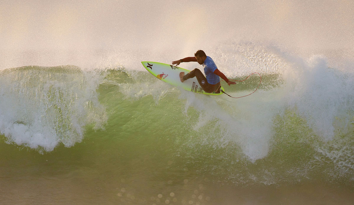 ichel Bourez of Tahiti (pictured) advanced directly to Round 3 of the JBay Open at Supertubes, Jeffreys Bay, South Africa today, defeating Brett Simpson (USA) and Taj Burrow (AUS) in Round 1 with a heat total of 12.00 points (out of a possible 20.00). Photo: <a href=\"https://www.worldsurfleague.com/\">WSL</a>/<a href=\"https://instagram.com/kc80\">Cestari</a>