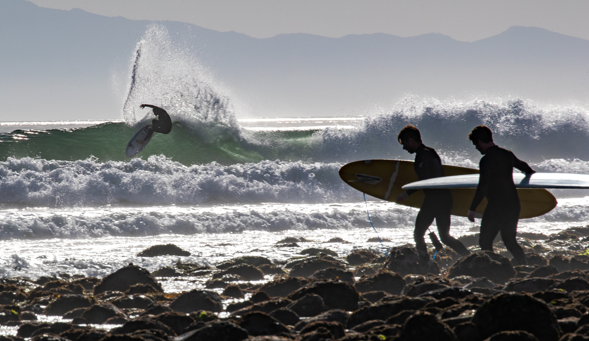 ...Rincon afternoon, 2022. What’s so great about these two photos is that they’re interchangeable: someone ripping on a shortboard while others cruise up the beach with longboards was, and still is, what Rincon is all about. 